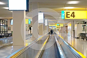 Horizontal escalator, slidewalk, or moveator at an airport