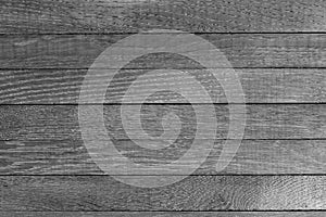 Horizontal grayscale wooden table background. Top view. Copy space