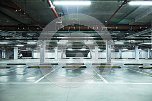 Horizontal image of empty underground parking lot