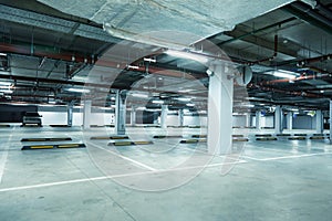 Horizontal image of empty underground parking lot