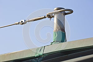 Horizontal lifeline fall protection system with inox stainless steel cable on copper roof