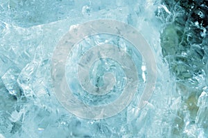 Horizontal lightened slices of blue marble quartz ice background. Cold calm colors icy background ideal for your design