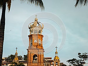 Horizontal low angle view of our Lady of Guadalupe church in Puerto Vallarta, Mexico at sunset