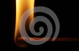 Horizontal match with flame