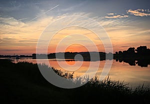 Sunset over the Malta lake, Pozna?, Poland, June 2019 photo