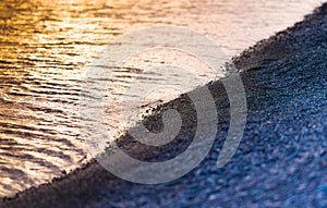 Horizontal pebble beach sunset landscape