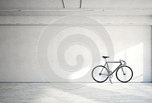 Horizontal Photo Blank Grungy Smooth Bare Concrete Wall in Modern Loft Studio with Classic bicycle. Soft Sunrays