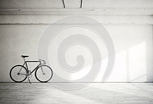Horizontal Photo Blank Grungy Smooth Bare Concrete Wall in Modern Open Space Studio with Classic bike. Soft Sunrays