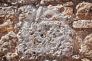 Texture of ancient wall build from bricks and stones