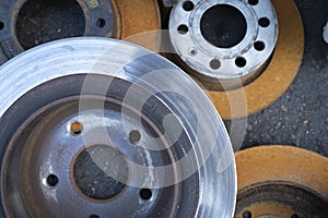 Brake Rotors that have been Discarded on the Ground photo