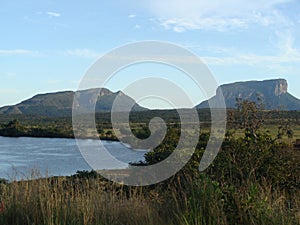 Savanna, river and tepuy In Venezuelan Amazon photo