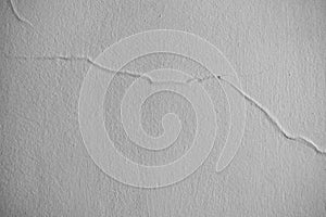 Horizontal picture of white wall with crack