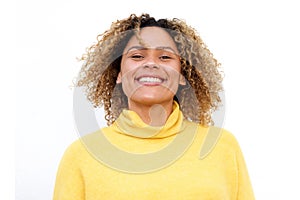 Horizontal portrait of beautiful african american woman smiling against isolated white background
