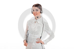 Horizontal portrait of young cheerful call office worker girl with headphones and microphone looking at the camera and