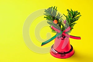 Horizontal Red Christmas bells on a yellow background