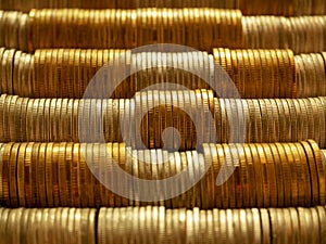 Horizontal row of silver coins and gold coins. Finance saving money and business concept