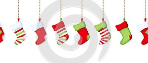 Horizontal seamless border with hanging Christmas socks. Vector illustration.