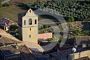 Horizontal shot of a bell tower in Comarca Matarranya, Teruel province, Spain photo