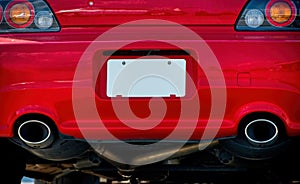 Blank White License Plate On Red Car Bumper REVISED photo