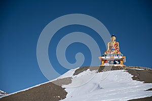 Horizontal shot of Buddha statue in Langza village. Spiti Valley in winter
