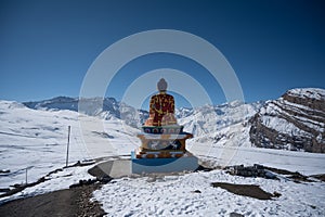 Horizontal shot of Buddha statue in Langza village. Spiti Valley in winter