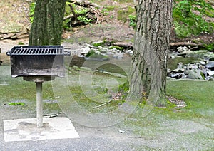 Heavily Used Grill at a Picnic Area photo
