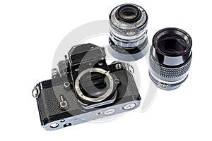 Heavily Used 1970Ã¢â¬â¢s Professional Camera With 35mm and 105mm Lenses photo