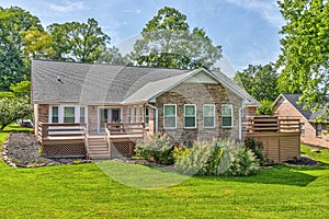 Rear View Of Home With Twin Decks photo