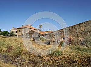 Horizontal shot of rural red-roofed houses, countryside scenery