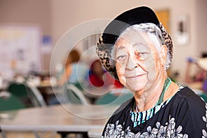 Horizontal Shot of Smiling African American Woman in a Senior Center