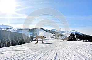 Horizontal shot of a snowy landscape from Prislop pass, Maramures region in Romania