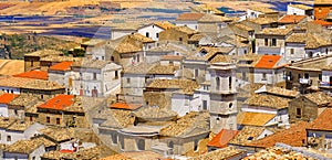 Horizontal south italy background of textured houses colorful warm tone of Apulia village town of Bovino