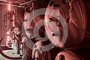 Horizontal tanks at brewery in red