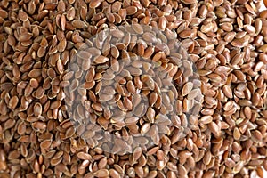 texture and brown flax-seed background.