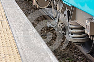 Horizontal View of Close Up of the Shock Absorbers of the Wheels