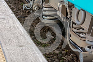 Horizontal View of Close Up of the Shock Absorbers of the Wheels