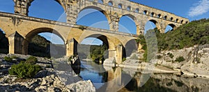 Horizontal view of famous Pont du Gard, old roman aqueduct in France