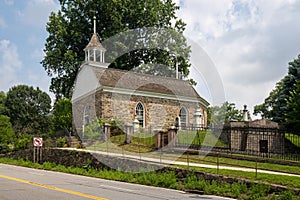 A horizontal view of the historic Old Dutch Church. A 17th-century stone church featured