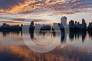 Horizontal view of the sunrise reflecting over New York City\'s Central Park Jacqueline Kennedy