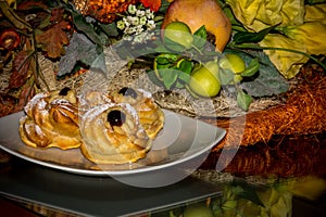 Horizontal View of Traditional Baked Italian Food Called Zeppole Made With Eggs, Cherries and Flour during Saint Joseph