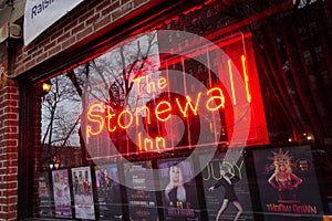 New York, NY / United States - March 3, 2020: Closeup on the window and sign of The Stonewall Inn. Gay bar & National Historic