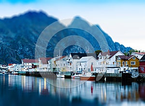 Horizontal vivid Norway town mountain pier reflections lights ba