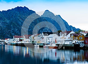 Horizontal vivid Norway town pier with reflections lights