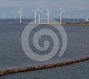 Horizontal wind turbine generators and breakwater