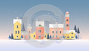 Horizontal winter cityscape with town in snowfall. Landscape with night city street, beautiful old buildings, towers and