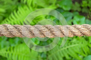 Horizontally stretched thick rope made from natural fiber