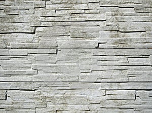 Horizontally structured white brick wall