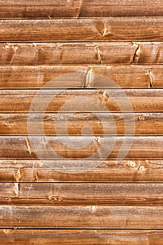 Horizontally tiled stained wood wall texture background