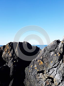 View of the sea and rocks against