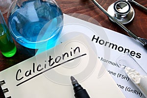 Hormone calcitonin written on notebook.